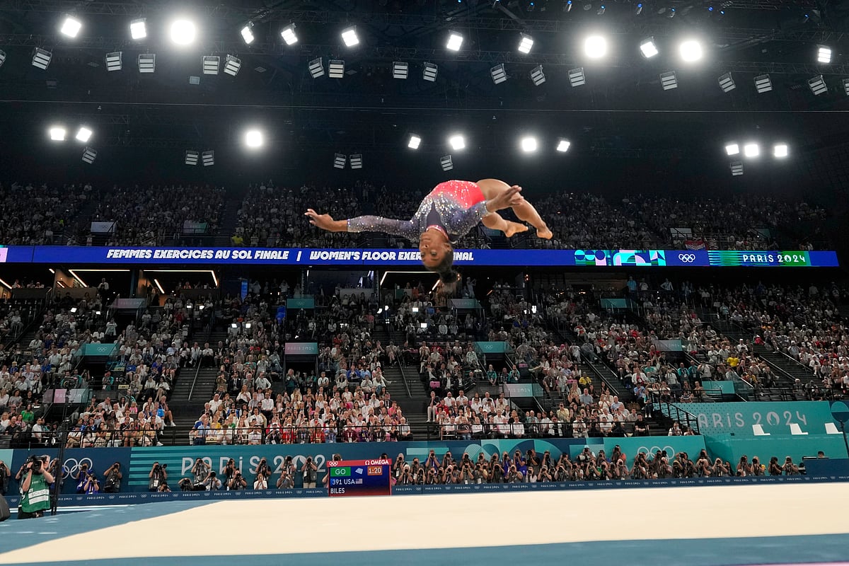 (AP Photo/Abbie Parr) : Simone Biles, of the United States, competes during the women's artistic gymnastics individual floor finals at Bercy Arena at the 2024 Summer Olympics, Monday, Aug. 5, 2024, in Paris, France.